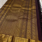 Aubergine brown Pure Silk Kanjivaram saree with intricate Annapakshi border and gold zari buttas