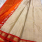 Amber Shubhra Butta — Pure Kanchipuram Silk Saree
Ivory body with golden zari buttas and vibrant amber-orange pallu
Pure 3gm zari • Silk Mark Certified • Free Shipping within USA