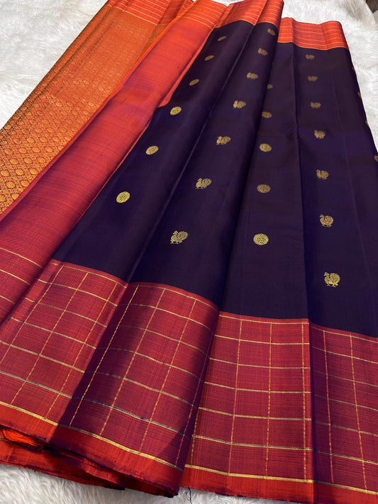 Minmini – Deep Purple Pure Kanchipuram Silk Saree with Gold Zari Buttas, Fiery Orange Checked Zari Border & Rich Gold Brocade Pallu with Traditional Motifs