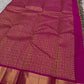A classic Kanchipuram in Pattani Kattam checks with green, magenta, mustard, and cream.
Finished with a contrast pink border and pallu.
Paisley and chakram motifs in a graceful grid add timeless charm.