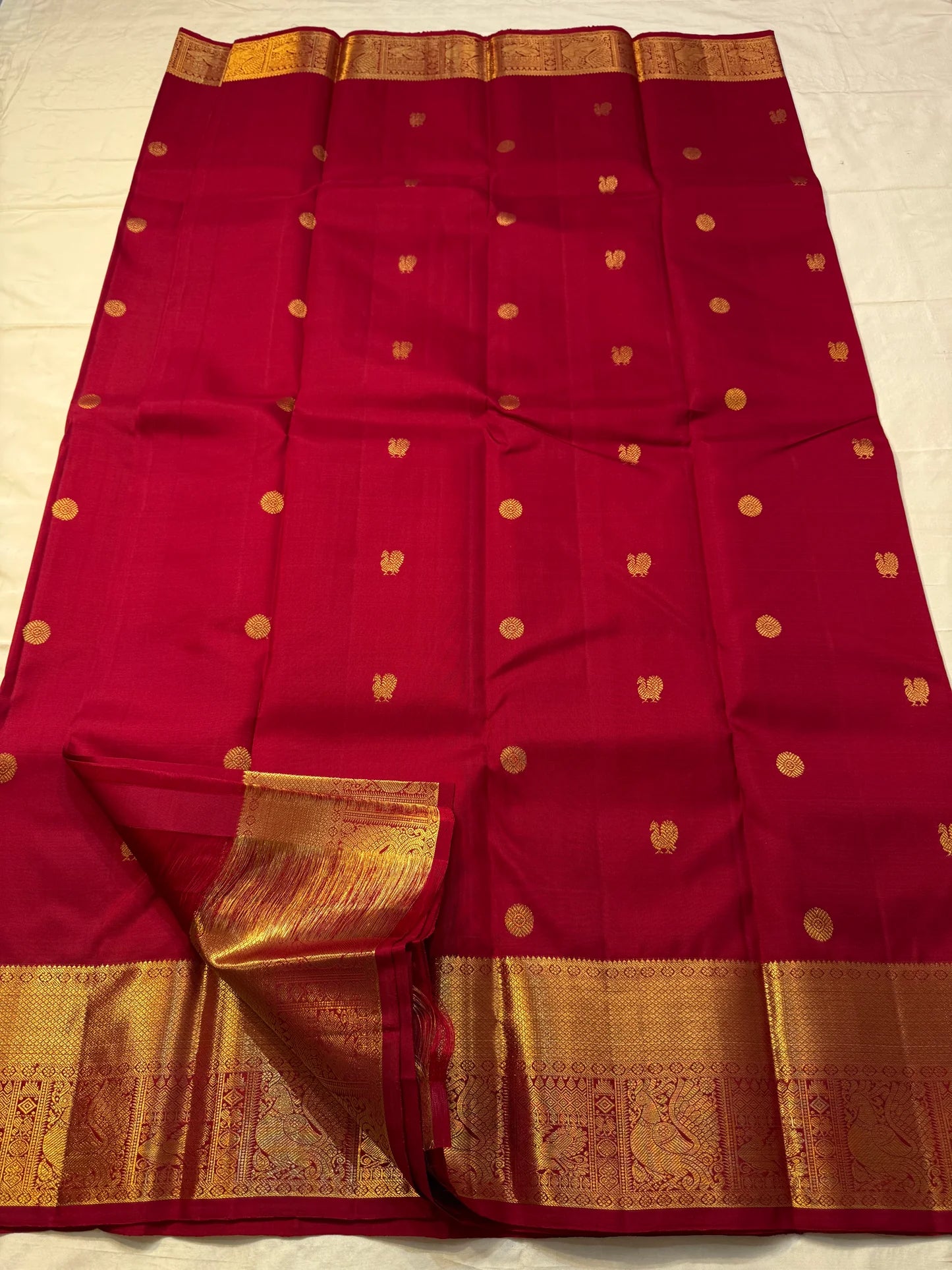 Vermillion Glory — Deep Red • Pure Silk Kanchipuram Saree
Gold zari buttas with grand peacock borders & brocade pallu
Silk Mark Certified • Free USA Shipping • Ships in Two Weeks ✅