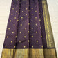 Deep Plum Coin Zari (Pure Kanchipuram Silk)

 Aubergine/plum body with gold chakram & mayil buttas

Self deep-purple border with antique-gold kasu-mālai (coin) motifs

Silk Mark Certified • Free USA Shipping • Ships in Two Weeks