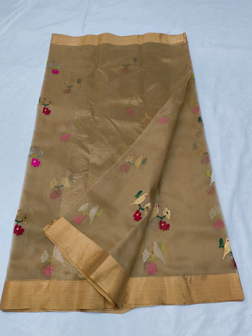 Pure Chanderi Silk Saree
Floral & Bird Embroidery on Sheer Gold-Beige
Tissue Zari Border • Lightweight • Elegant Drape