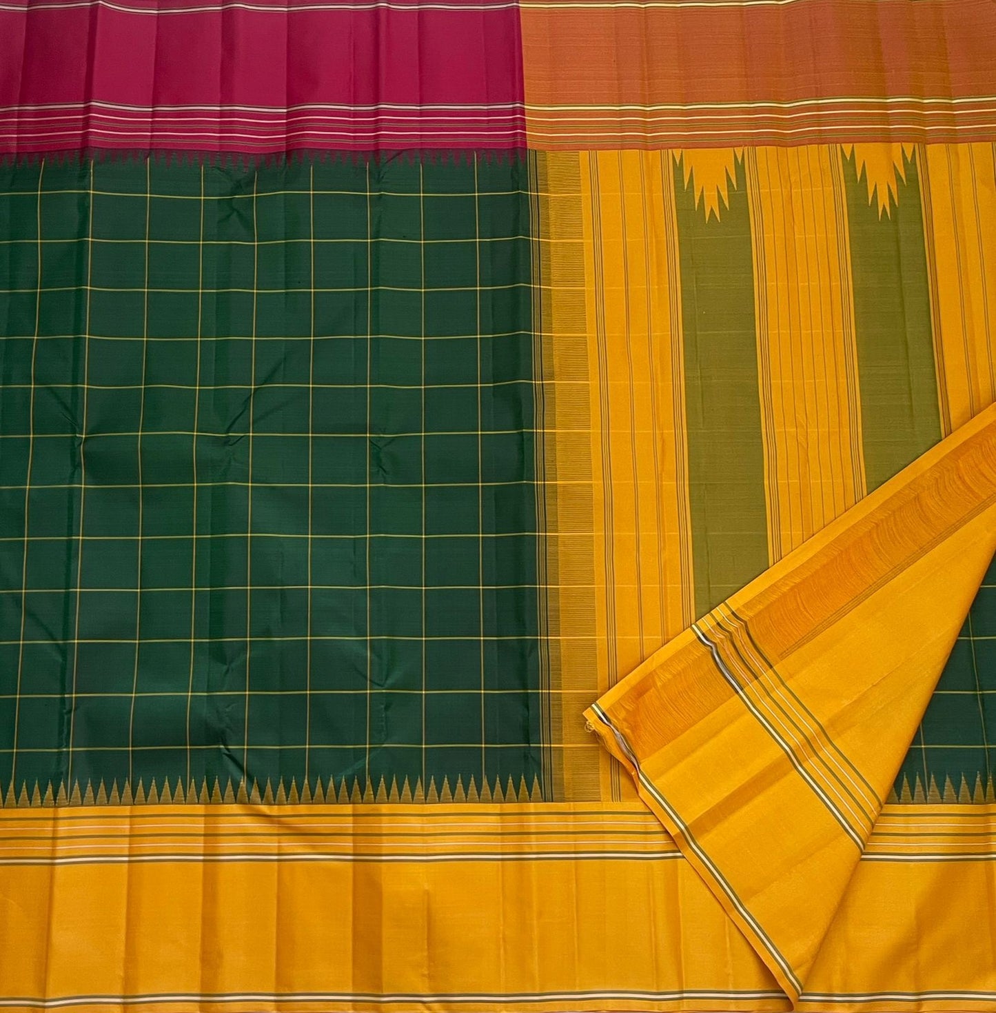 Vasantha Oli Kattam — Pure Silk Kanchipuram
Radiant mustard-yellow body with parrot-green kattam checks 🌿
Temple korvai borders & raspberry-pink contrast pallu ✨
Lightweight festive handloom weave with gold zari accents 💫
Silk Mark Certified • Free Ship