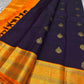 Jamun Purple Kesar – Korvai Kanchipuram Pure Silk Saree

Regal jamun-purple body adorned with antique-gold floral buttas

Kesari-orange korvai border with chakra roundels, vines & chevron zari

Free shipping withinUSA silk mark certified ships in 2 weeks