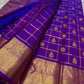 Leelavati Kattam
Amethyst Purple Kanchipuram Silk Saree
Zari-Woven Checks with Elephant Procession Border