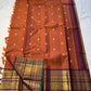 Rust Orange Pakshi Kattam – Pure Korvai Kanchipuram Silk Saree

Rust-orange micro-checked body with zari rosette & mango buttas

Plum korvai border with pakshi medallions & emerald selvedge; ships in two w

Silk Mark Certified | blouse Stitching available
