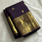 Deep Plum Coin Zari (Pure Kanchipuram Silk)

 Aubergine/plum body with gold chakram & mayil buttas

Self deep-purple border with antique-gold kasu-mālai (coin) motifs

Silk Mark Certified • Free USA Shipping • Ships in Two Weeks