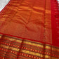 Vermilion Varisaipet – Pure Kanchipuram Silk Saree
Deep Vermilion Red Body with Golden Zari Checks & Buttas
Grand Varisaipet Border with Temple & Floral Motifs
Radiant Red-Orange Pallu Adorned with Lustrous Zari

Silk Mark Certified, delivery in 2 weeks