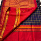 Rani Maragatham Zari Kattam — Pure Silk Kanchipuram (Handloom)
Purple  body with fine gold kattam checks & zari lines • Vibrant vermillion red border with temple coin motifs
Rich red  pallu with antique-gold zari panels • Silk Mark Certified ✅