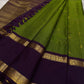 Iravati – Earthy Green Kanchipuram Pure Silk Saree
A graceful weave in a rare earthy green tone, adorned with gold zari kattam and butta.
Accented by a rich plum rettapet border with delicate flower vine motifs.