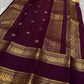 Saanvi – Lotus Pink & Magenta Shot Kanchipuram Silk Saree
Saanvi features zari buttas of mayils and chakrams across the body. A deep wine rettapettu border showcases twin peacocks in a temple arch. The pallu mirrors this grandeur with sorgavasal motifs !