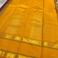 Full view of mustard pallu and zari border on pure Kanchipuram silk saree with tassels, shipped from New Jersey USA