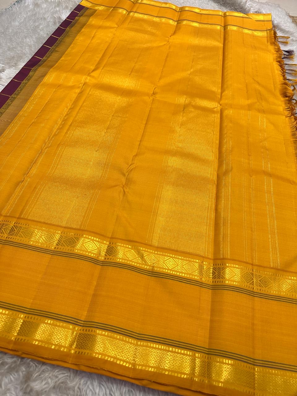 Full view of mustard pallu and zari border on pure Kanchipuram silk saree with tassels, shipped from New Jersey USA