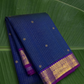 Ink blue sapphire Kanchipuram silk saree with antique gold zari kattam and royal orchid border