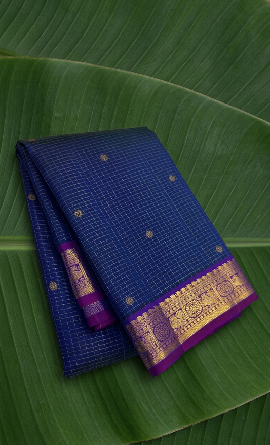 Ink blue sapphire Kanchipuram silk saree with antique gold zari kattam and royal orchid border