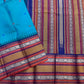 Peacock-teal body with woven silk-thread buttas in navy & coral hues
Korvai contrast ruby-maroon borders with gaja-chakram & temple motifs
Grand varisaipettu striped pallu in navy, mustard & maroon tones
Silk Mark Certified • Ships in Two Weeks