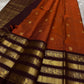 Ember Yazhi – Pure Kanchipuram Silk Saree
Burnt Orange Body with Vaira Oosi Stripes & Yazhi Buttas
Contrast Maroon Varisaipet Border with Gold Zari Panels
Grand Maroon Brocade Pallu with Intricate Motifs

Silk Mark Certified, delivery in 2 weeks