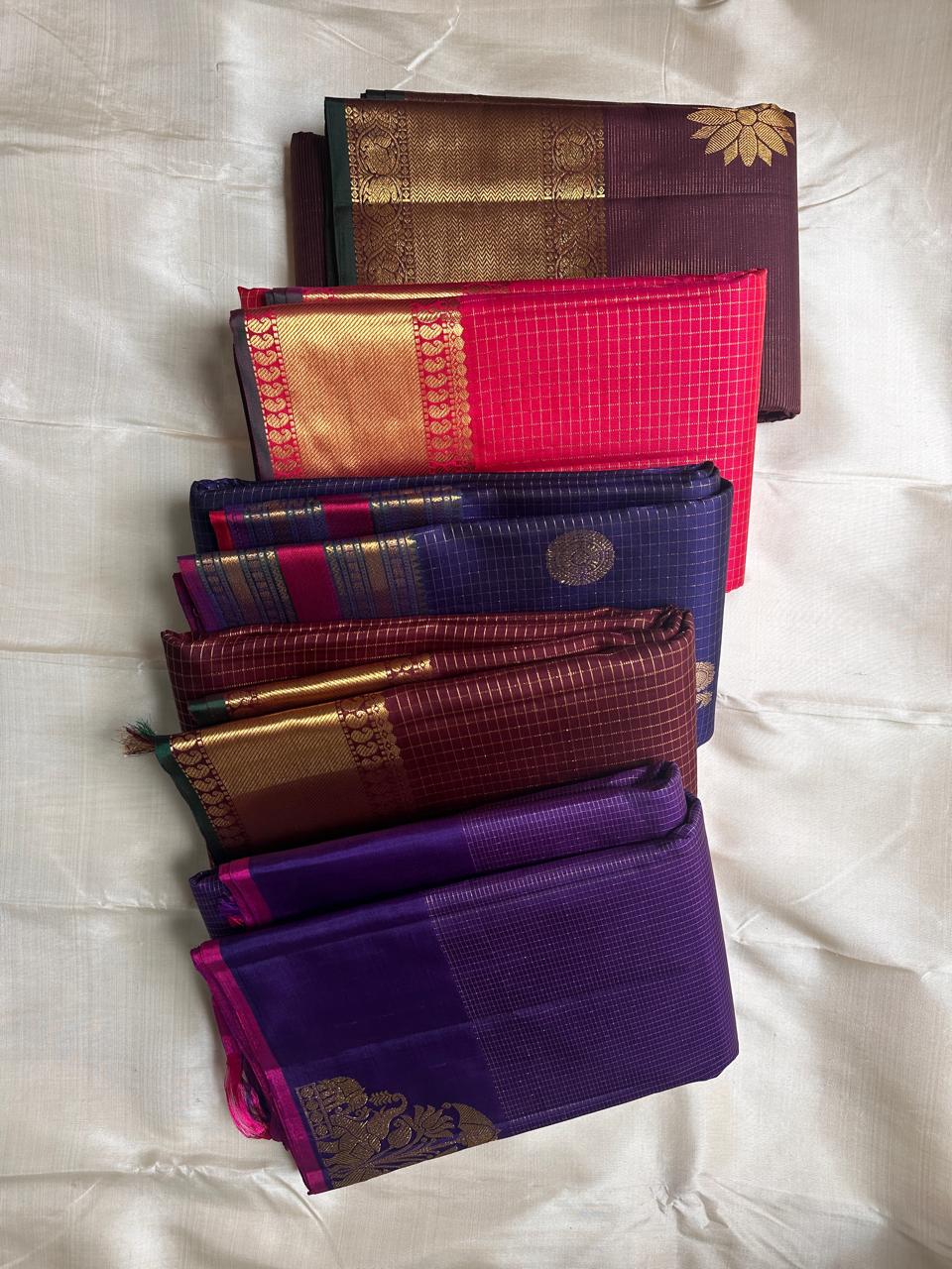 Pomegranate Pink Kattam
Pure Kanchipuram Silk with Gold Zari Grids
Festive, Heirloom-Bright, Temple-Bound Radiance