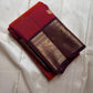 Shyama – Dusky Tangerine Kanchipuram Silk Saree with Purple Vanasringaram Border & Mayil Buttas