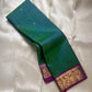 Vrindavan Meadow
Peacock Vairaoosi in Emerald & Lagoon Blue
Pure Kanchipuram Silk · Zari-Woven Border Grandeur