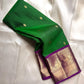 Green Amethyst Grove — Pure Silk Kanchipuram Saree
Emerald-Green Body with Gold Buttas & Royal-Purple Elephant Zari Border ✨
Silk Mark Certified • Free USA Shipping • ships in 2 weeks