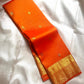Agnika – orange Kanchipuram Silk Saree with Mayil Chakram Butta & Orange Border Fiery and regal, Agnika is a pure Kanchipuram silk saree featuring a rich red body adorned with intricate Mayil Chakram buttas.