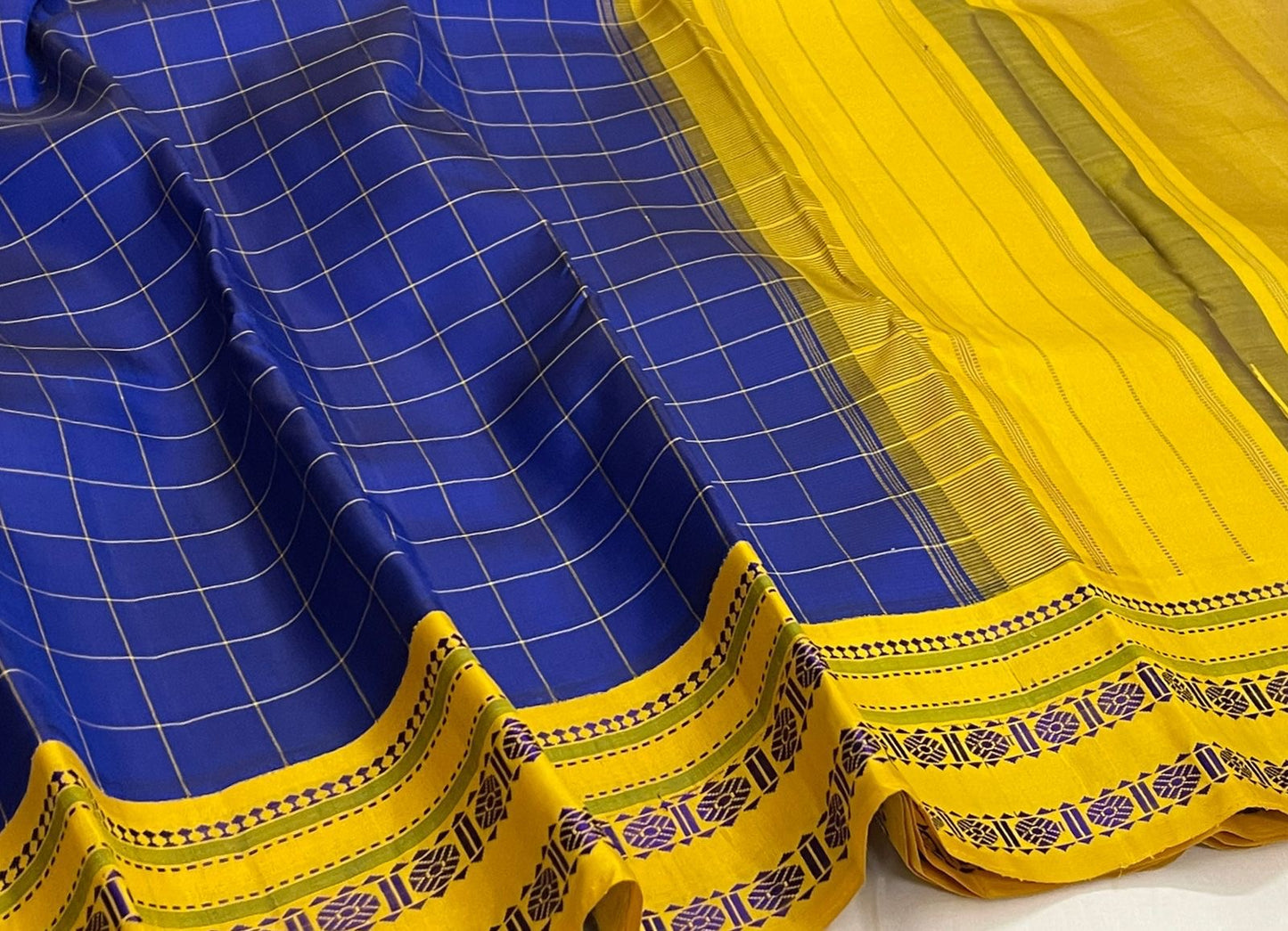 Wide border display of royal blue checked pure Kanchipuram silk saree with mustard yellow border bands, shipped from New Jersey USA
