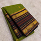 Authentic Kancheepuram Varisaipet saree featuring forest green silk and charcoal border craftsmanship