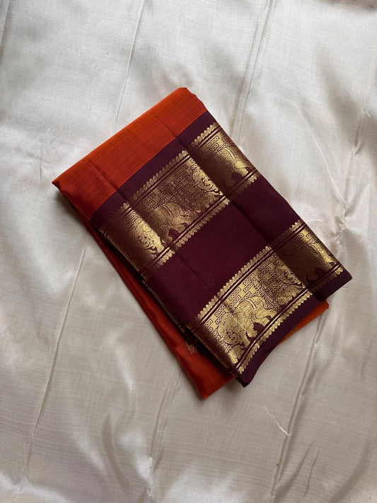Amber brown pure Kanchipuram silk saree with rettapet antique gold zari border
