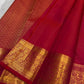 Traditional antique gold zari border on radiant pink Kanchipuram silk saree