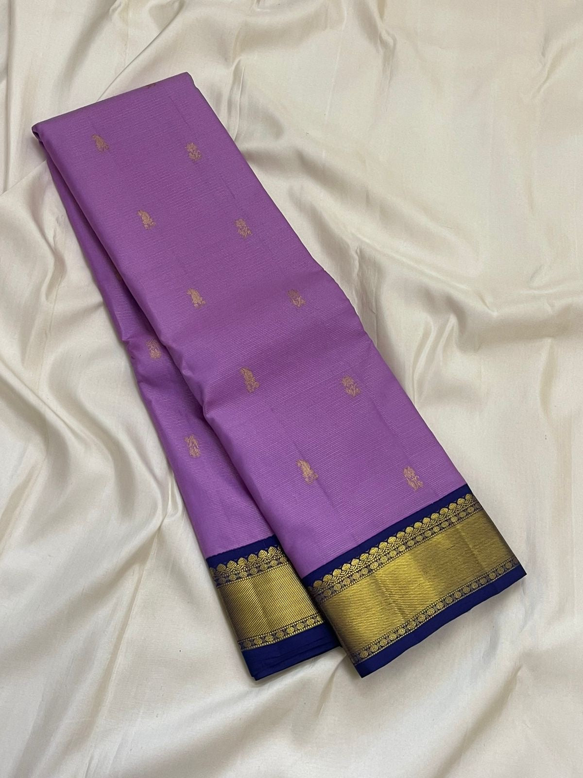 Lavender leaf butta pure Kanchipuram silk saree with deep blue korvai border