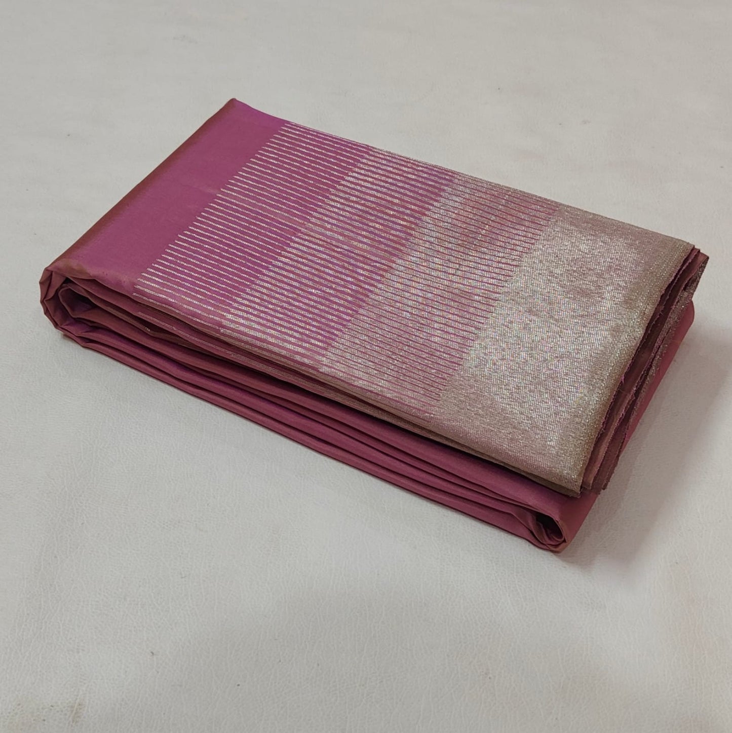 Idam Living delicate pink Ettukol pure silk saree styled flat with zari border detail