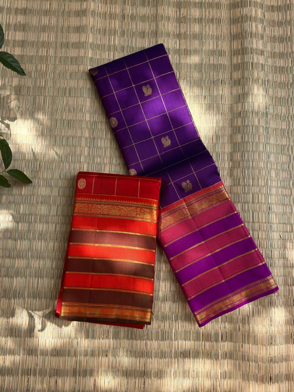 Royal Purple pure silk Kanjivaram saree, Varisaipet weave with Rani Pink border — folded view
