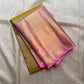The color of “festive” vibrant golden sampanga with a pink border and Pallu pure silk Kanchipuram saree bavanji rettapet vanasringaram border