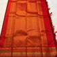 Red-gold zari woven pallu spread showing diamond jaal and traditional border detailing