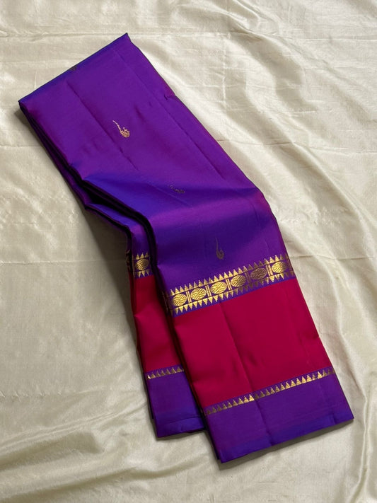 Vadamalli Muthuseer – Korvai Kanchipuram Silk Saree
Pure handloom silk | Deep vadamalli (violet) body with muthuseer and rudraksham motifsin  pink silk 
Grand rani-pink zari-pallu | ships in two weeks silk mark certified