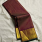Shyama Vairaoosi — Pure Silk Kanchipuram

Deep Shyama brown with micro Vairaoosi pinstripes

Temple-column antique gold zari border, bottle-green selvedge

 Grand striped zari pallu with hand-tied tassels

Silk Mark Certified • free shipping