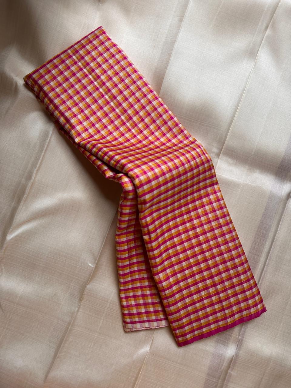 Mutyam – Handwoven Borderless Kanchipuram Pure Silk Saree with Traditional Paalum Pazhamum Baby Checks or kasa kasa kattamDual Contrast Green & Pink Selvedges, and a Subtle Zari Woven Pallu, silk mark certified, ships in two weeks