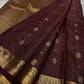 Zari Kattam Araimaadam – Coffee Brown, Pure Kanchipuram Silk Saree
Coffee-brown body with zari kattam checks, floral & mango buttas
Grand antique-gold border with floral/peacock vine;
Silk Mark Certified | Blouse Piece Included |ships in 1 week