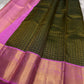 Iniya – Bottle Green & Pink Kanchipuram Pure Silk Saree with Floral Jaal and Mayil Border
Graceful and refreshing, Iniya is a handwoven masterpiece in bottle green with soft pastel pink accents. Delicate floral jaal and mayil motifs dance across the drape