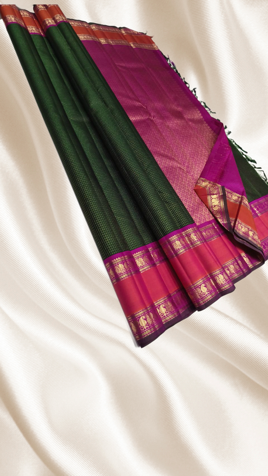 Bottle green Zari  kattam checks with magenta border rettapet in peach pink and peacock motif