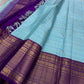 Aqua Amethyst zari kattam Pure Kanchipuram Silk Saree with blue Checks & Purple Border
Radiant sky-blue silk woven with delicate golden checks.
Grand purple korvai borders with elephant and floral motifs.

Silk Mark Certified, delivery in 2 weeks