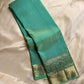 Vibha pastel sage green  Pure Kanchipuram Silk Saree Blending the Grandeur of South Indian Weaving with Paithani-Inspired Floral Zari Borders and a Lustrous Rose Gold zari Pallu