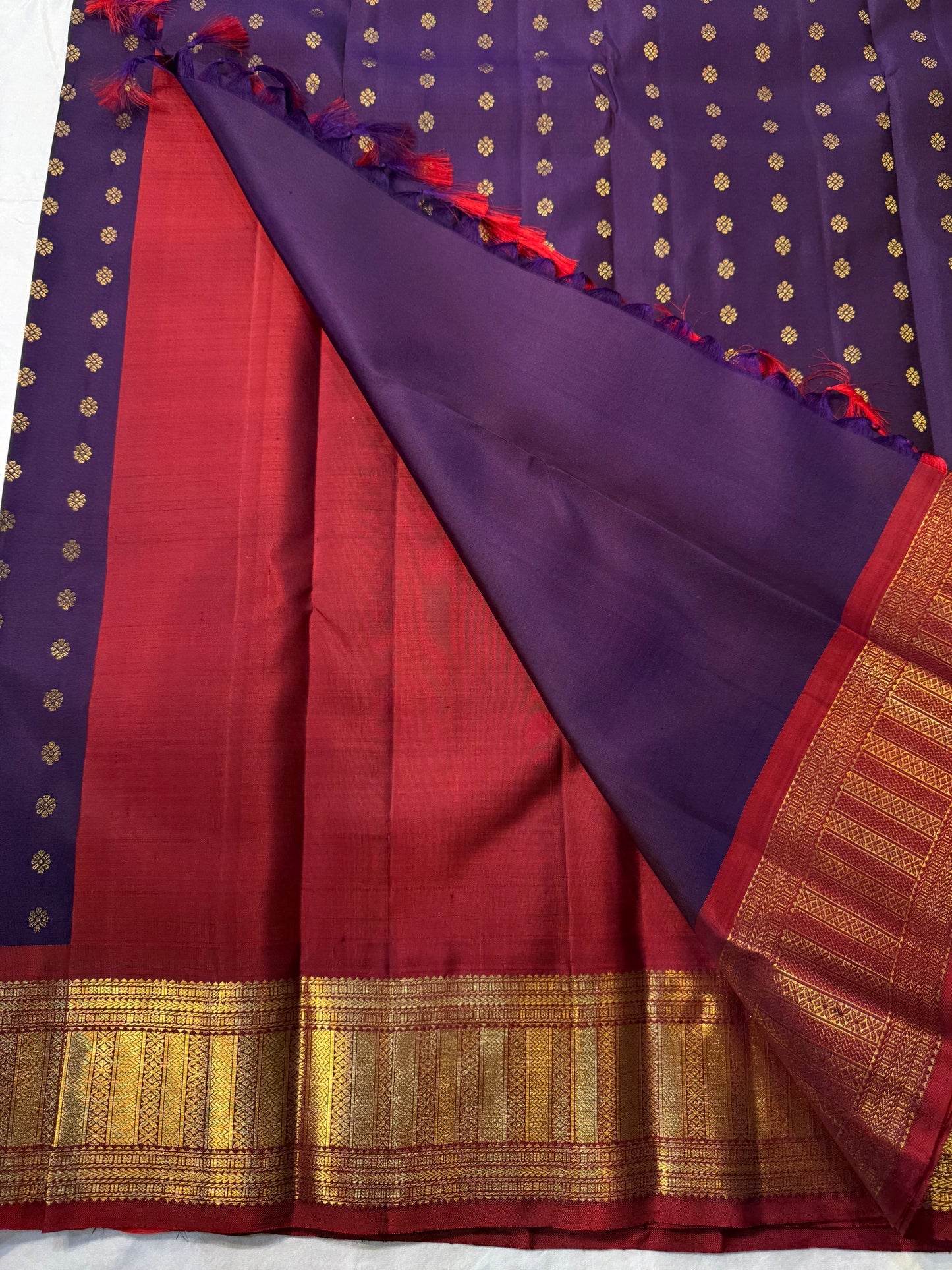 Sindhu – Royal Purple Kanchipuram Pure Silk Saree with Gold Zari Floral Buttas, Crimson Rettapet Border & Ornate Pallu