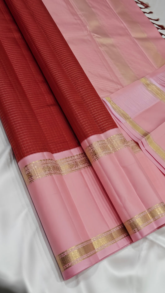 🌸 Lotus Rouge — Pure Kanchipuram Silk Saree
Brick red body with fine oosi stripes, contrast blush-pink borders & antique-gold zari detailing
Silk Mark Certified • Free Shipping within USA • Ships in Two Weeks • Ready in 1 Week
