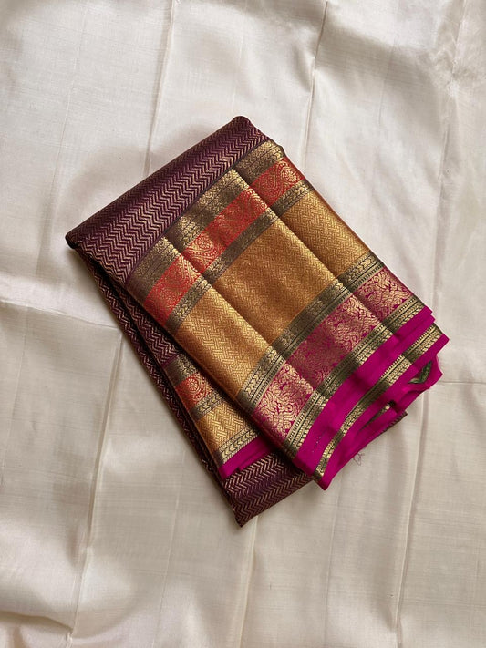 Kanchipuram pure silk chocolate, brown Zari chevrons with magenta varisaipet border