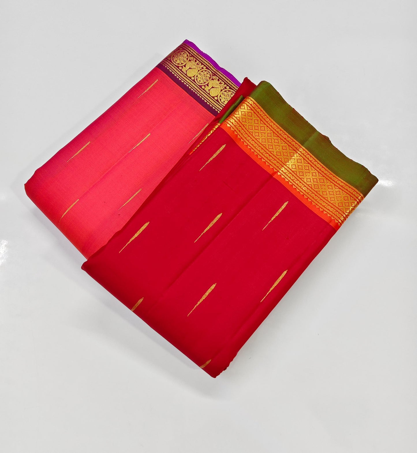 Mullai Moggu Pink — Pure Kanchipuram Silk Saree
Vibrant mullai-pink body with zari mullai bud buttas & plum-purple zari borders
Grand plum pallu with floral vines • Silk Mark Certified • Free Shipping within USA • Ships in Two Weeks