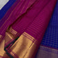Sapphire Zari Kattam – Pure Kanchipuram Silk Saree
Brilliant Sapphire Blue Body with Gold Zari Checks
Broad Golden Border with Magenta Highlights & Temple Motifs
Royal Magenta Pallu with Lustrous Zari Stripes

Silk Mark Certified, delivery in 2 weeks