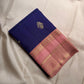 Double Kili motifs seated on Kamalam forms on royal blue Kanjipuram silk